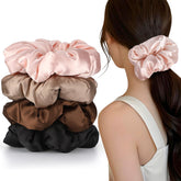 Auroray gomas satinadas grandes en empaque, ideal para regalo y uso diario.