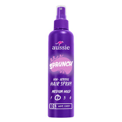Aussie Sprunch hairspray bottle showing strong hold for curls