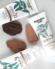 Australian Gold tinted mineral lotion swatch reveals matte finish on skin.