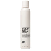 Authentic Beauty Concept Amplify Mousse bottle close-up showing lightweight volume.