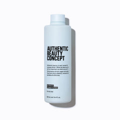 Authentic Beauty Concept Hydrate conditioner bottle front view, showcasing clean vegan formula for daily hydration