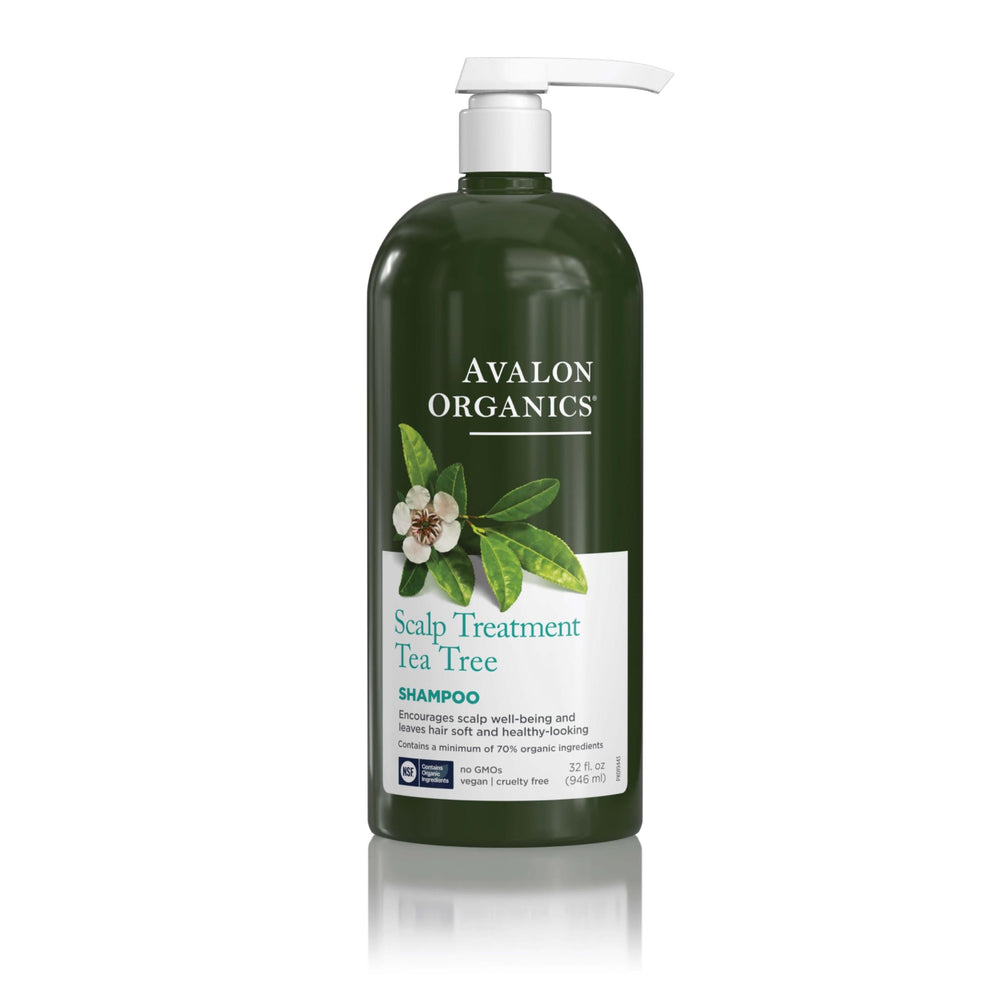 Avalon Organics Scalp Treatment Tea Tree Shampoo bottle on a bathroom shelf, promoting daily cleansing.