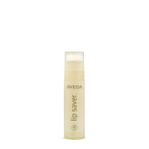 Bálsamo labial Aveda, envase elegante, ideal para hidratación diaria.