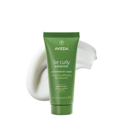 Aveda Be Curly Advanced Curl Enhancer bottle shows silicone-free frizz control and shine.