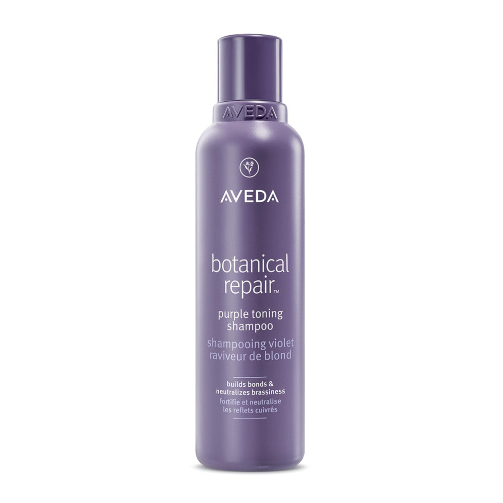 Aveda Botanical Repair Purple Toning Shampoo bottle neutralizing brassiness in blonde hair.