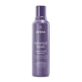 Aveda Botanical Repair Purple Toning Shampoo bottle neutralizing brassiness in blonde hair.