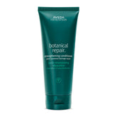 Aveda Botanical Repair Strengthening Conditioner bottle fronts plant-powered strength for damaged hair.
