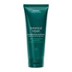 Aveda Botanical Repair Strengthening Conditioner bottle fronts plant-powered strength for damaged hair.