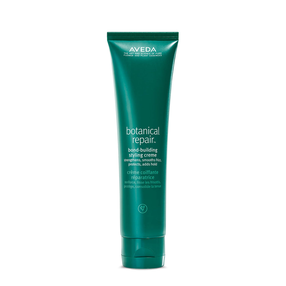 Aveda Botanical Repair Styling Creme bottle on a clean surface for heat-protected styling.