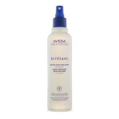 Aveda Brilliant Medium Hold Spray bottle front view showing brand and shiny finish for all hair types.