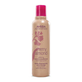 Aveda Cherry Almond Leave-In Conditioner bottle on a shelf for detangling.