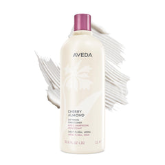 Aveda Cherry Almond Softening Conditioner bottle front with packaging for silky detangling