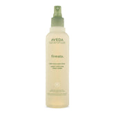 Aveda Firmata bottle showing firm hold and shine for lasting styles.
