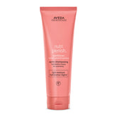 Aveda Nutriplenish Conditioner Light Moisture bottle close-up signaling hydration benefits for dry hair.