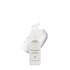 Phomollient de Aveda espuma ligera para volumen en cabello fino.