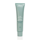 Aveda Scalp Solutions Exfoliating Scalp Treatment bottle pour offers cooling exfoliation for a refreshed scalp.