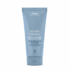 Aveda Smooth Infusion conditioner bottle for silicone-free frizz protection.