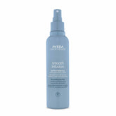 Aveda Smooth Infusion bottle front shows lightweight anti-frizz spray for blowouts.