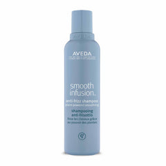 Aveda Smooth Infusion shampoo bottle showing silicone-free frizz protection.