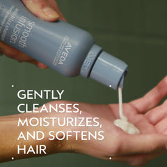 Creamy lather from Aveda Smooth Infusion shampoo cleanses and softens hair for manageability.