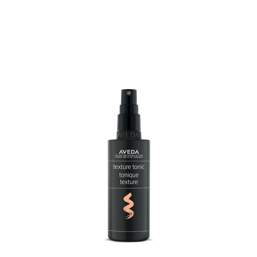 Aveda Texture Tonic bottle close-up showing design and versatile styling