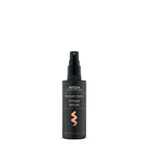 Aveda Texture Tonic bottle close-up showing design and versatile styling