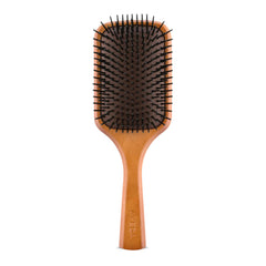 Aveda Wooden Paddle Brush detangles hair with extended bristles.