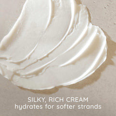 Aveeno shampoo label close-up shows natural ingredients.