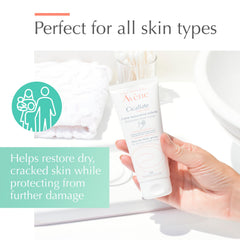 Applying Avène Cicalfate on dry cracked hands for quick absorption.