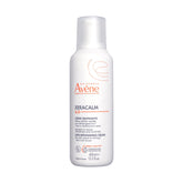 Avène XeraCalm A.D cream pump close-up showcasing a rich, non-greasy hydration for sensitive skin.