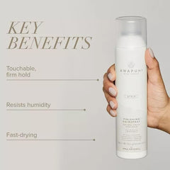 Spray mist from Awapuhi Wild Ginger finishing spray for quick-drying hold.