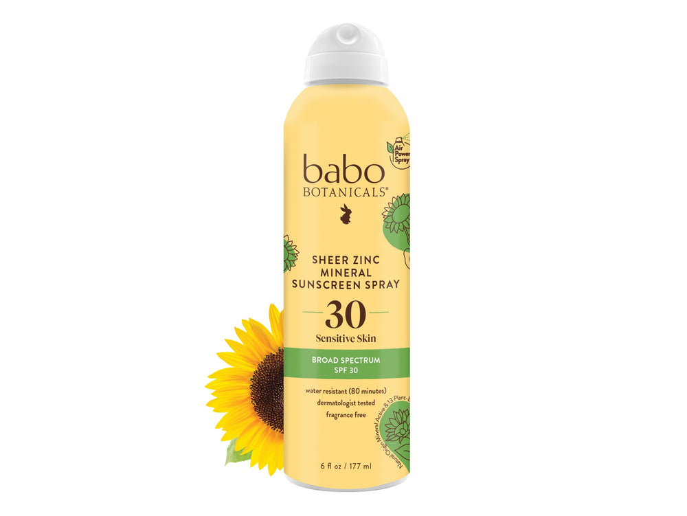 Babo Botanicals sheer zinc spray on face showing quick, light coverage for delicate skin