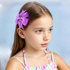 Babymatch pinwheel bows come in pairs, ideal for pigtails.