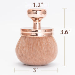 Rose-gold Babysheep brush head blends self tanner on legs and torso