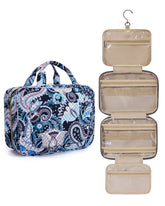 BAGSMART toiletry bag with hanging hook in blue paisley keeps cosmetics organized on trips.