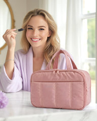 BAGSMART dark pink toiletry bag main compartments keep cosmetics organized during travel.