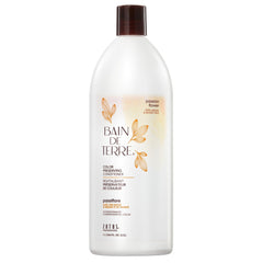 Bain de Terre Passion Flower bottle pour demonstrates color protection and luxurious conditioning.