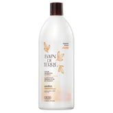 Bain de Terre Passion Flower shampoo bottle emphasizing color preservation for vibrant, long-lasting color.