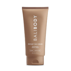 Bali Body Instant Tan Cream jar showing smooth, even tan color on skin.