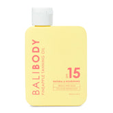 Bali Body Pineapple Tanning Oil SPF15 bottle showing protective, natural bronze potential.