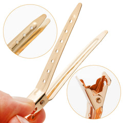Bantoye gold alligator clip with holes for precise sectioning.