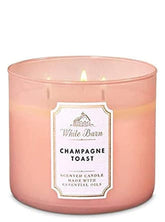 Bath & Body Works Champagne Toast 3-wick candle for warm ambiance.