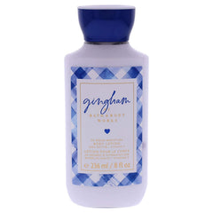 Bath & Body Works Gingham loción corporal, botella vertiendo, hidratación suave para la piel.