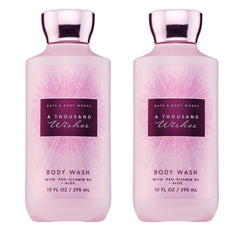 Bath & Body Works A Thousand Wishes, botella vista lateral, aroma festivo para la ducha.