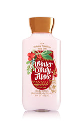 Bath & Body Works Winter Candy Apple loción corporal en botella, hidratación duradera.