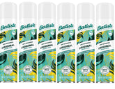 Batiste Dry Shampoo Original bottle pour showing oil absorption for a refreshed look