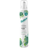 Batiste Waterless Foam bottle pour refreshes hair between washes