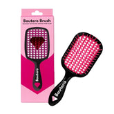 Bautero Sakura Blossom brush closeup highlighting flexible bristles for pain-free detangling.
