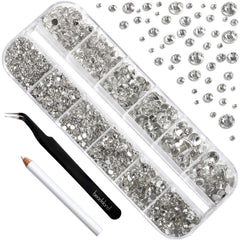 Beadsland tweezers and picking pen aiding precise rhinestone placement on nails