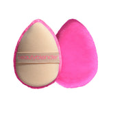 Beautyblender Pocket Puff compact powder-dispense for precise application on the go.
